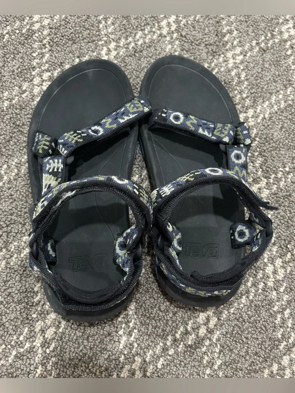 Teva Black Sandals with Blue Sole and Patterned Straps kids size 2